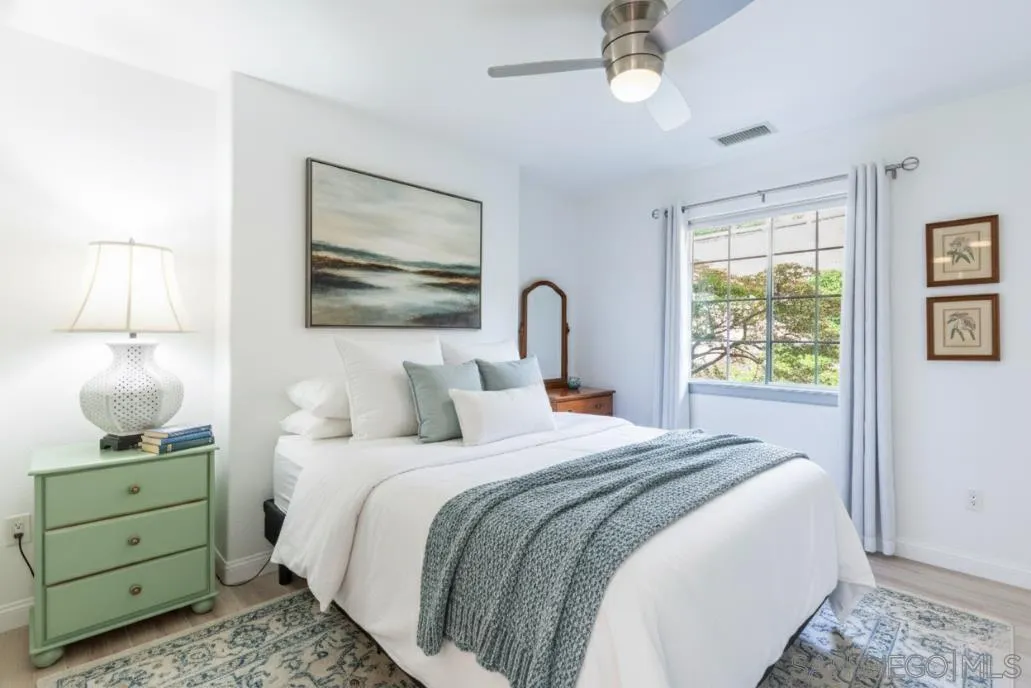 3649 Laketree Drive Fallbrook, CA 92028 - Photo 29 of 42 a bedroom with a bed and a window