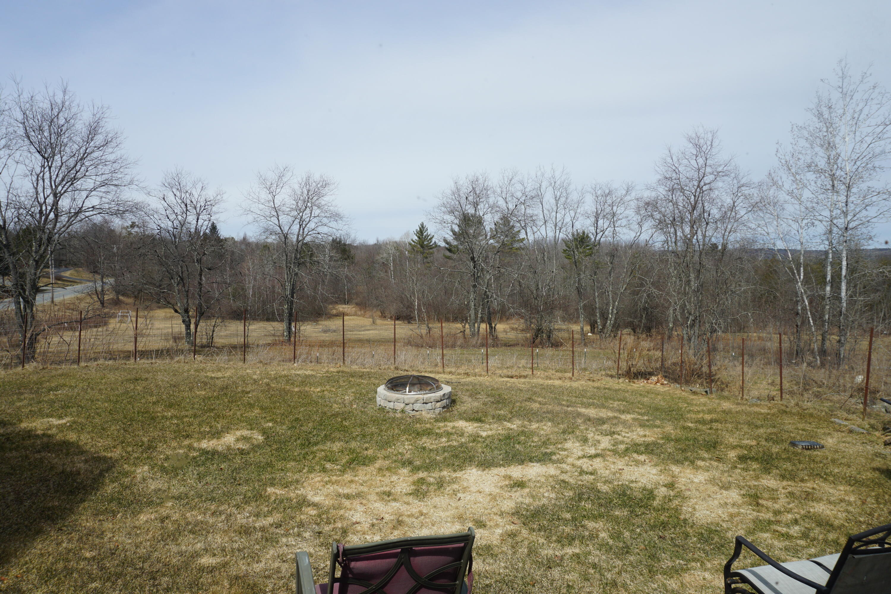 4 Walton Mills Road Cornville, ME 04976 - Photo 45 of 63 Firepit outside sunroom