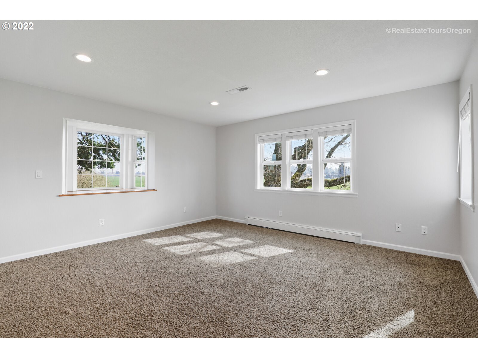 6360 Southwest Minter Bridge Road Hillsboro, OR 97123 - Photo 23 of 32 a view of an empty room with a window