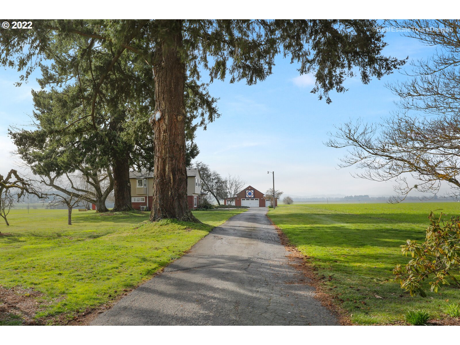 6360 Southwest Minter Bridge Road Hillsboro, OR 97123 - Photo 3 of 32 a view of a golf course with a big yard
