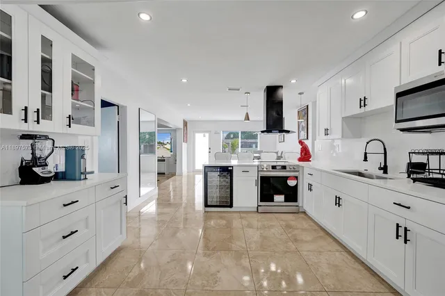 a bedroom with a bed and a dresser in it