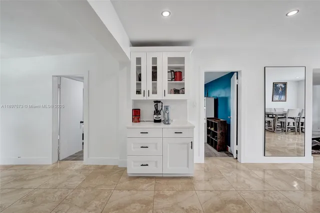 a bedroom with furniture and a bed