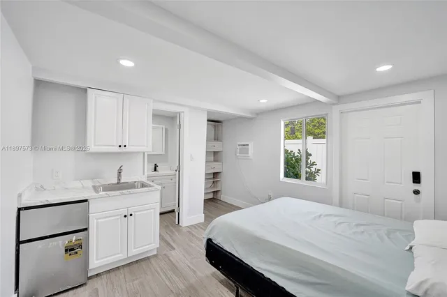 a view of a backyard with large trees