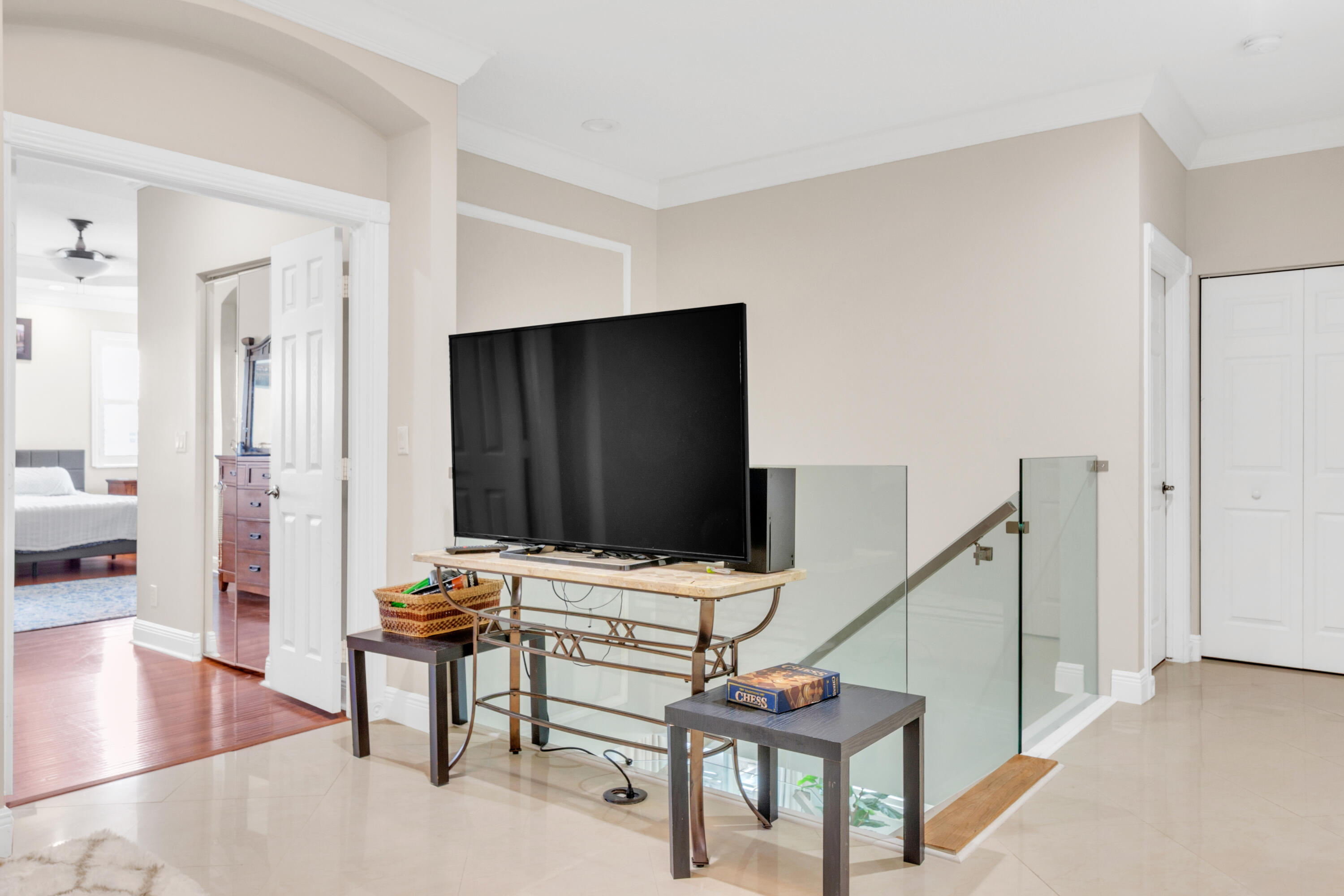 8155 Viale Matera Lake Worth, FL 33467 - Photo 9 of 14 a living room with furniture and a flat screen tv