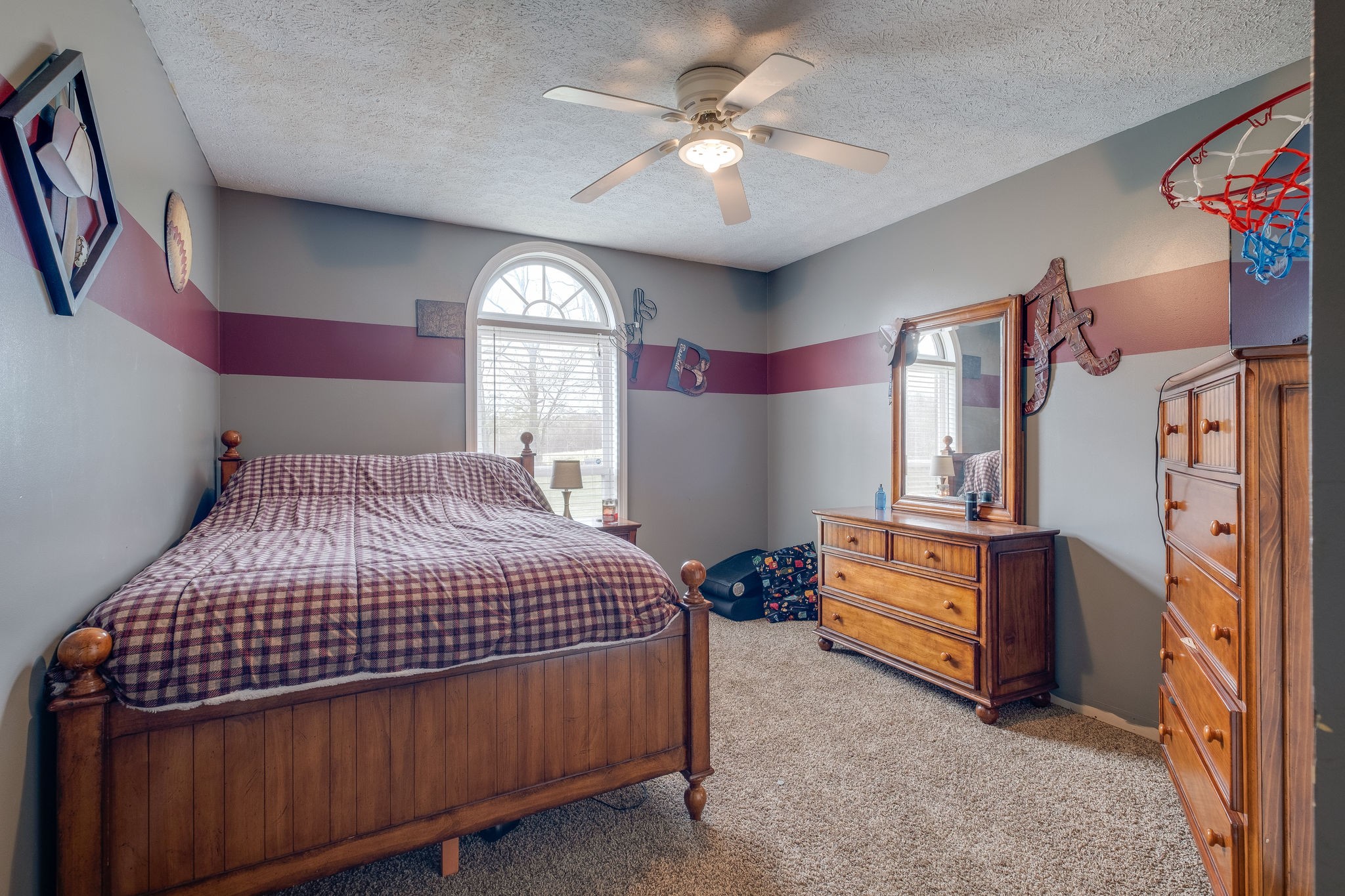 320 Crafton Road Portland, TN 37148 - Photo 15 of 28 a bedroom with a bed dresser and a window