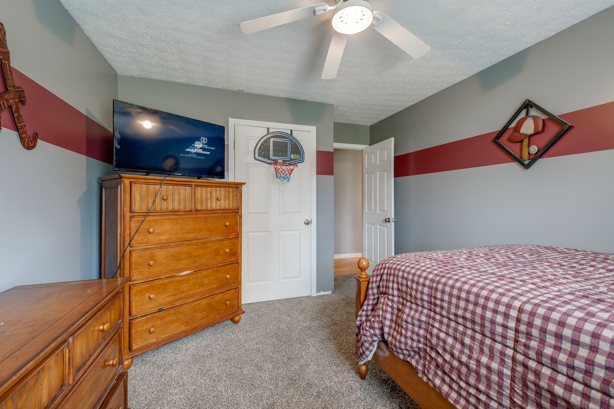 320 Crafton Road Portland, TN 37148 - Photo 16 of 28 a bedroom with a bed and a ceiling fan