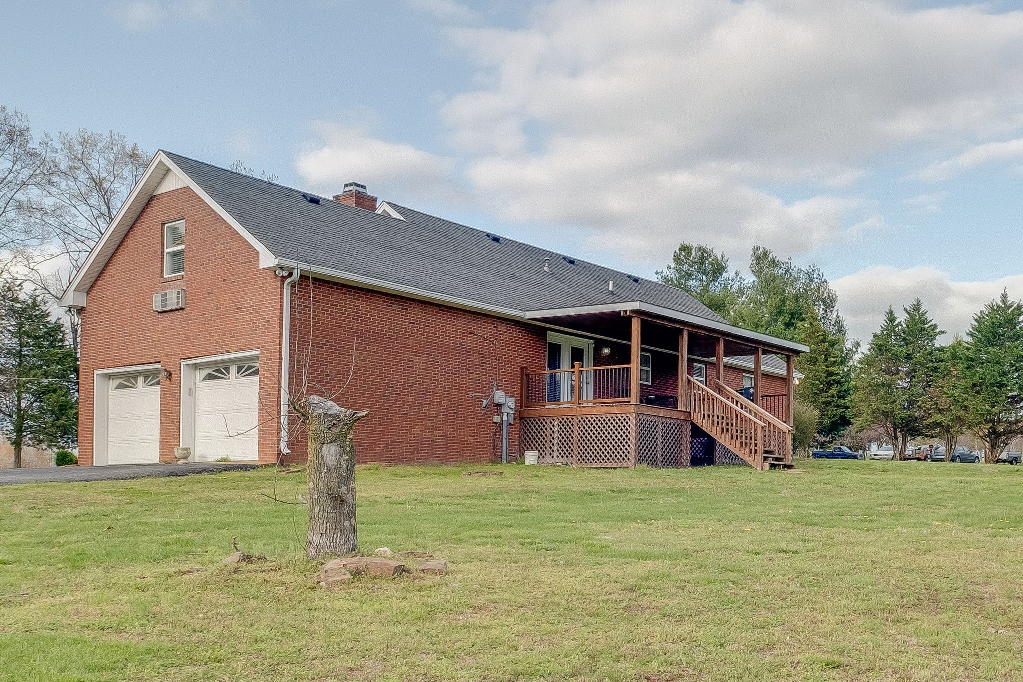 320 Crafton Road Portland, TN 37148 - Photo 27 of 28 a front view of house with yard and green space