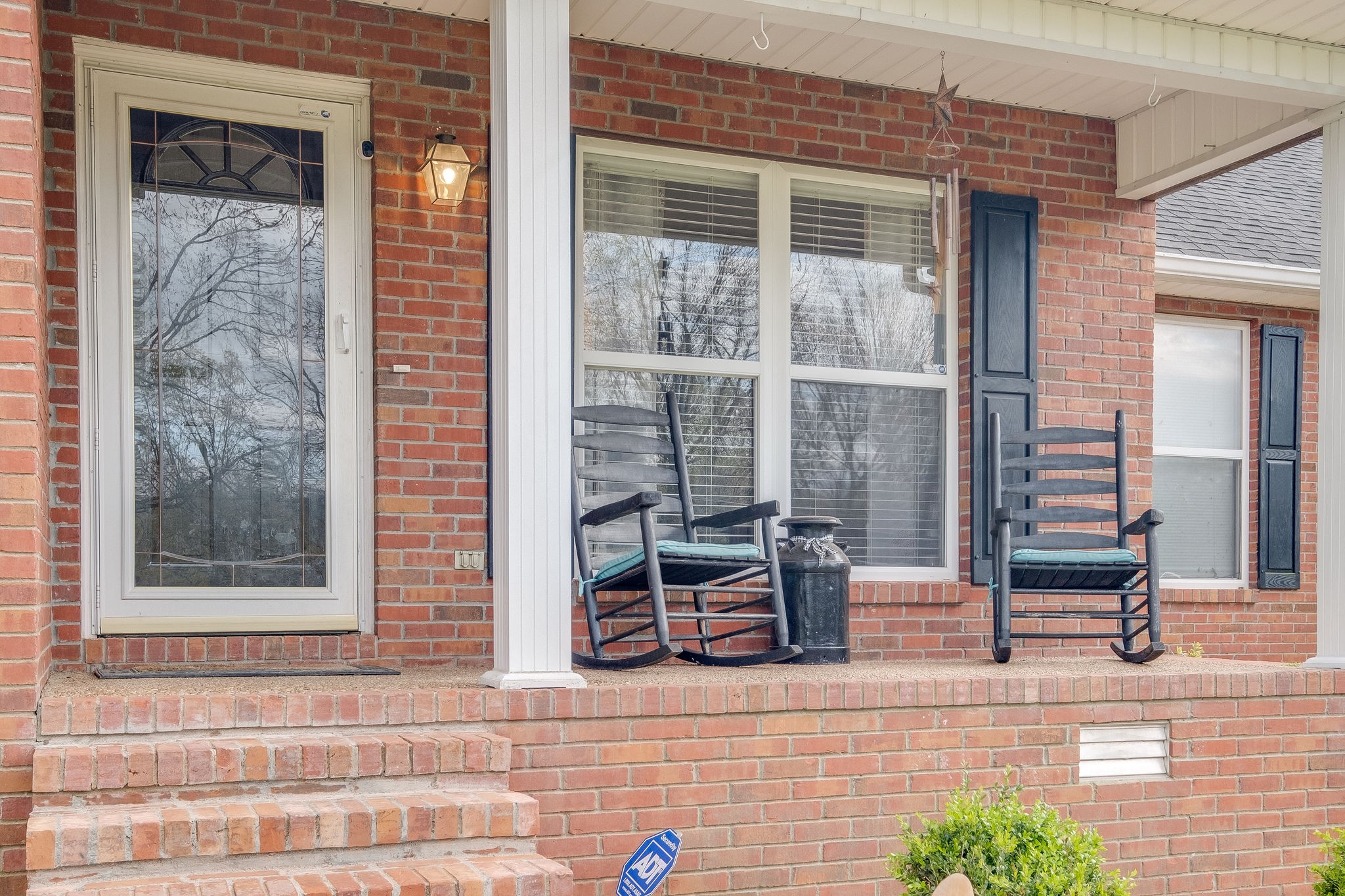 320 Crafton Road Portland, TN 37148 - Photo 5 of 28 a front view of a house with outdoor seating
