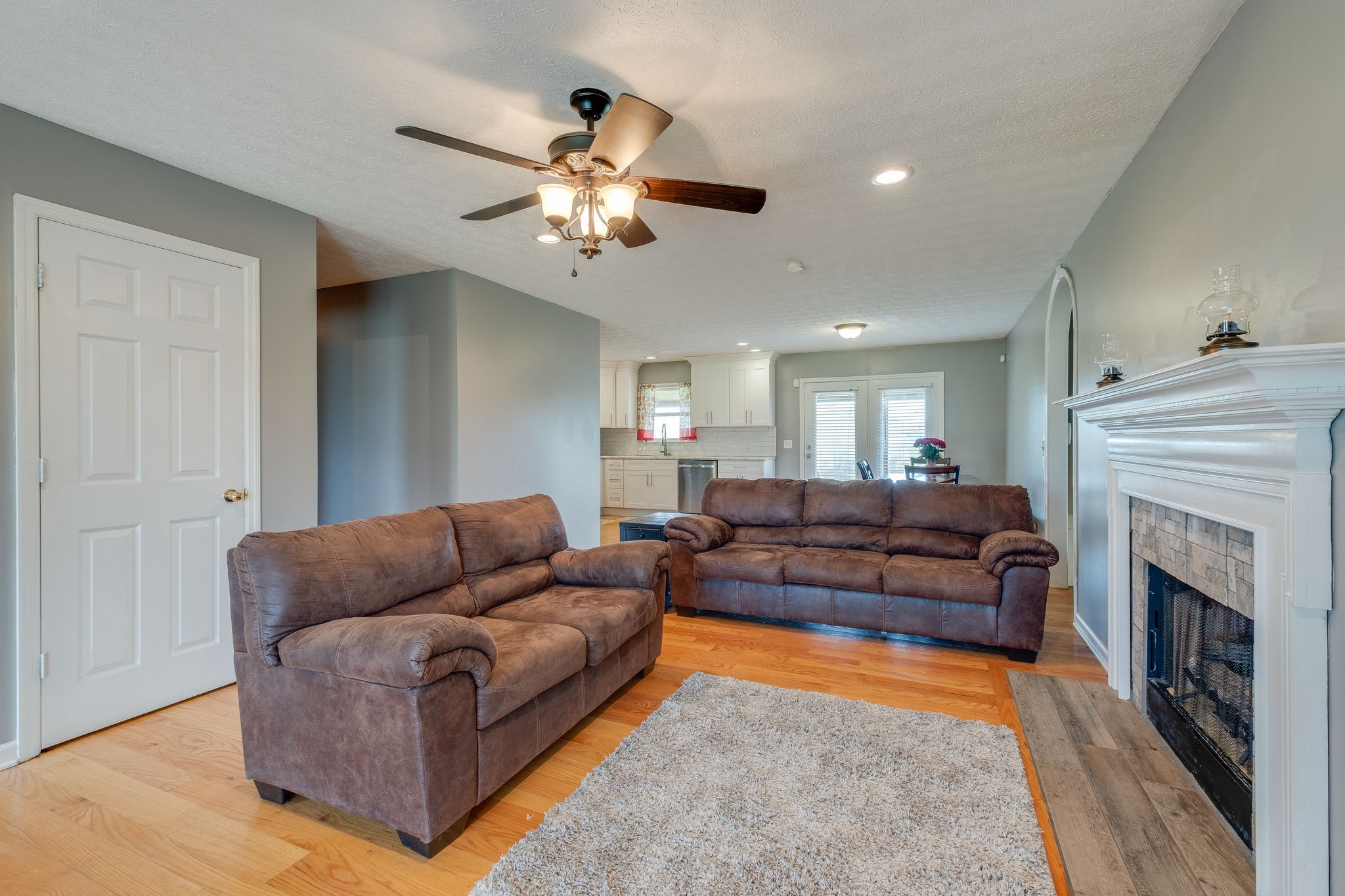 320 Crafton Road Portland, TN 37148 - Photo 9 of 28 a living room with furniture and a fireplace