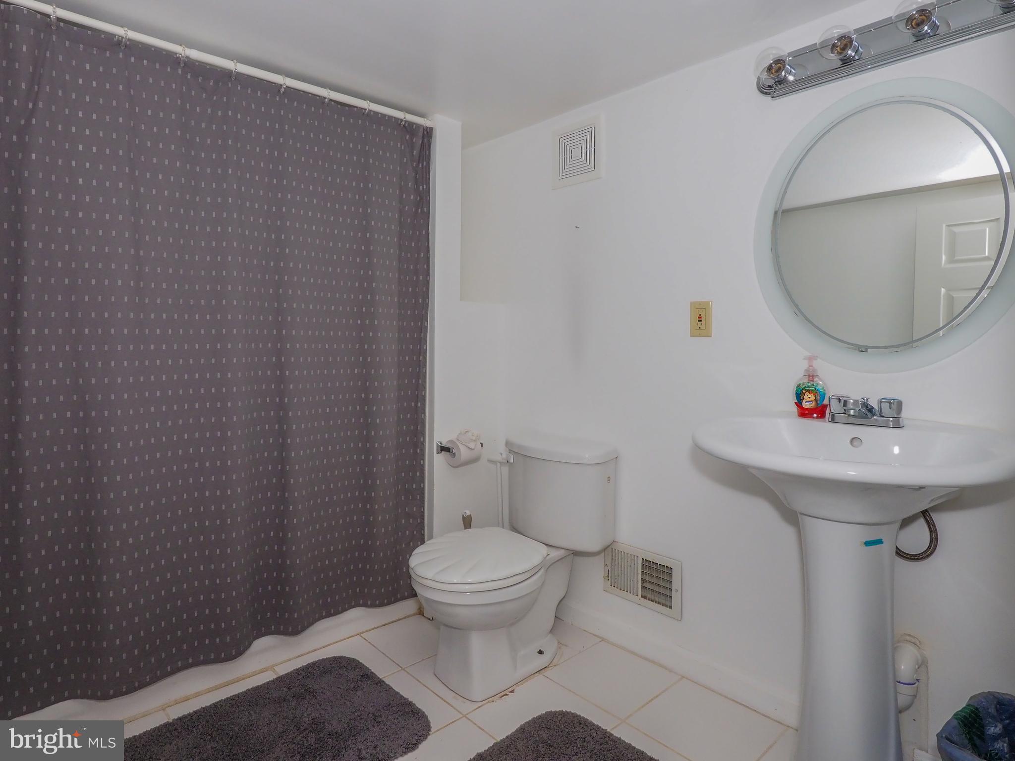 5526 Channing Road Baltimore, MD 21229 - Photo 17 of 42 2nd full bathroom