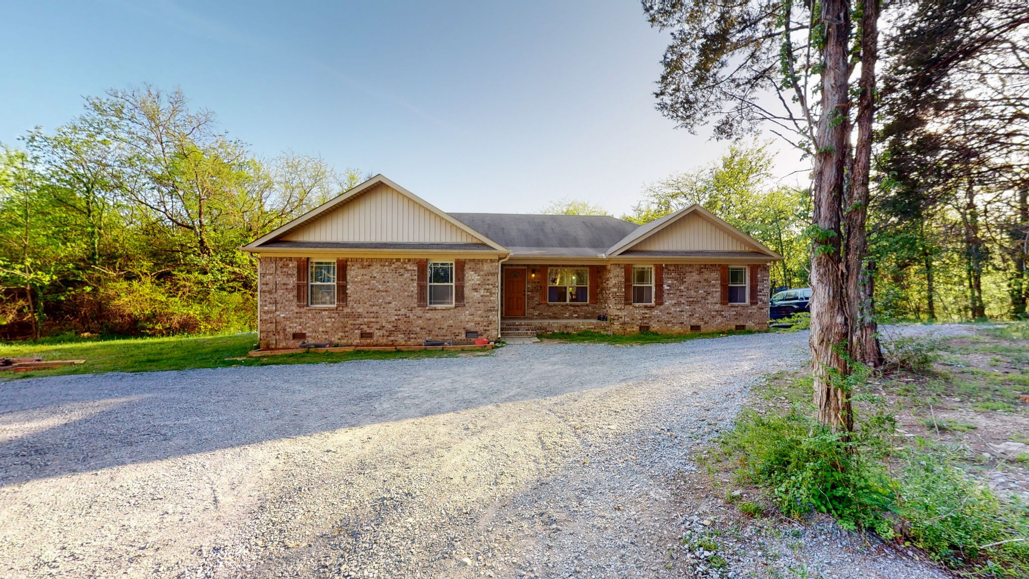 22 Warden Road Fayetteville, TN 37334 - Photo 2 of 34 a front view of a house with yard patio and green space