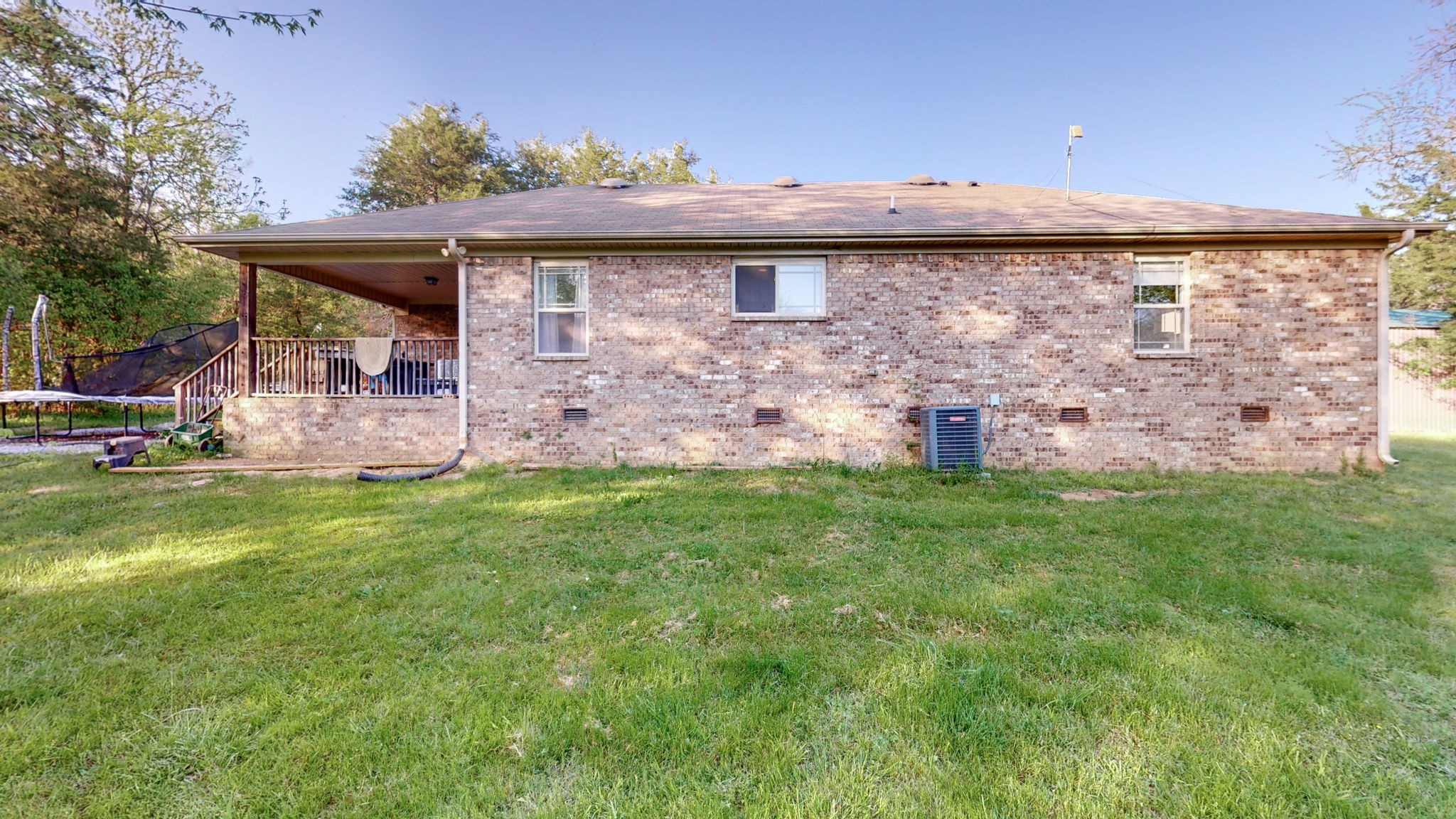 22 Warden Road Fayetteville, TN 37334 - Photo 22 of 34 a view of a house with a backyard and a garden