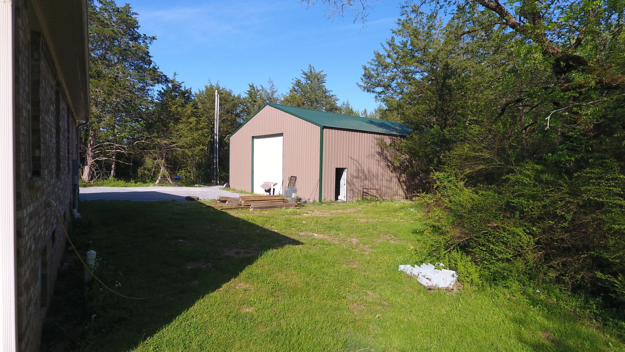 22 Warden Road Fayetteville, TN 37334 - Photo 29 of 34 a view of a backyard with large trees and plants