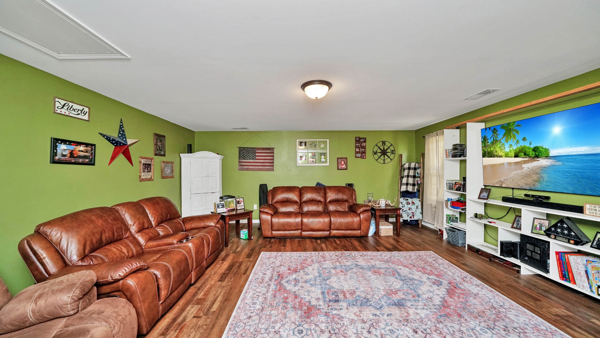 22 Warden Road Fayetteville, TN 37334 - Photo 9 of 34 a living room with furniture and a flat screen tv