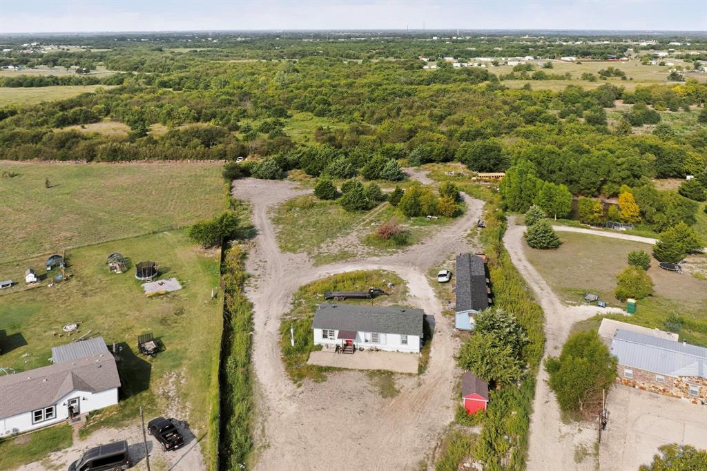 17607 Soman Nevada, TX 75173 - Photo 17 of 20 an aerial view of residential houses with outdoor space