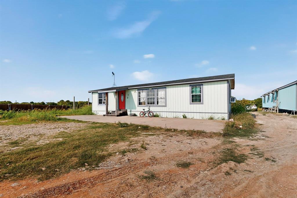 17607 Soman Nevada, TX 75173 - Photo 20 of 20 a view of a house with backyard and sitting area