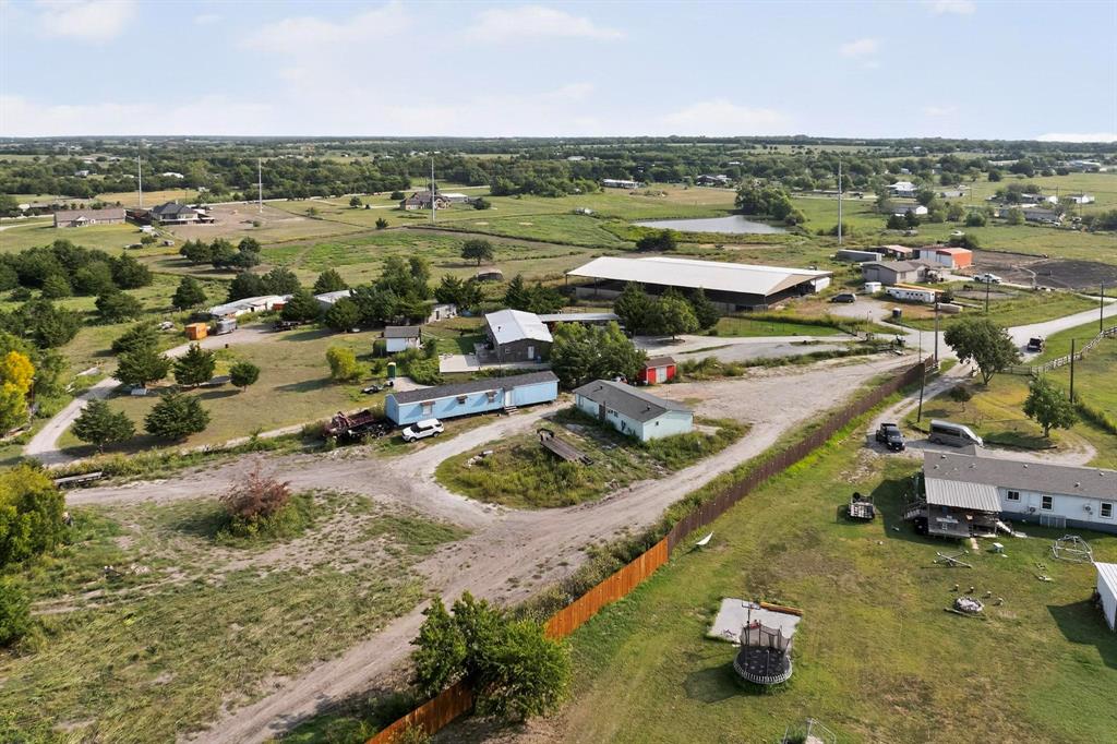 17607 Soman Nevada, TX 75173 - Photo 3 of 20 an aerial view of a house with a swimming pool