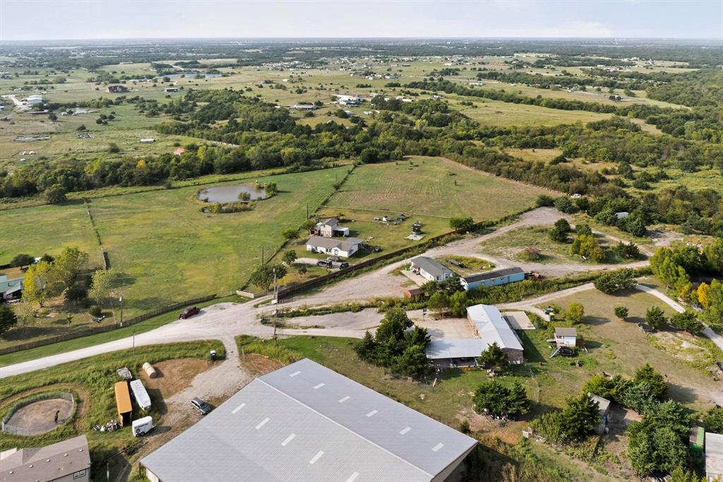 17607 Soman Nevada, TX 75173 - Photo 4 of 20 an aerial view of residential houses with outdoor space