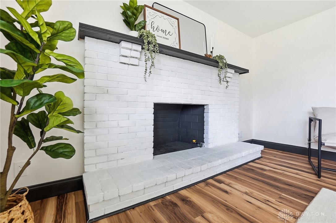 1628 Yorkshire Court Springfield, OH 45503 - Photo 10 of 47 This living space features a cozy hearth, perfect for gatherings on cool???????????????????????? evenings.