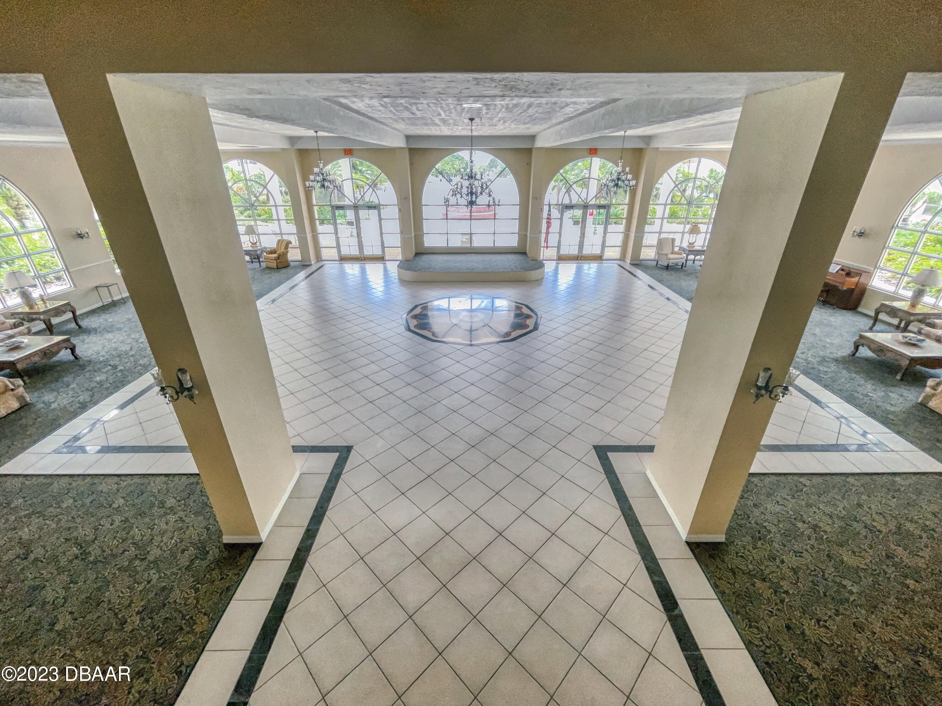 1 John Anderson Drive, Unit PH7 Ormond Beach, FL 32176 - Photo 103 of 134 a view of an entryway with floor to ceiling windows