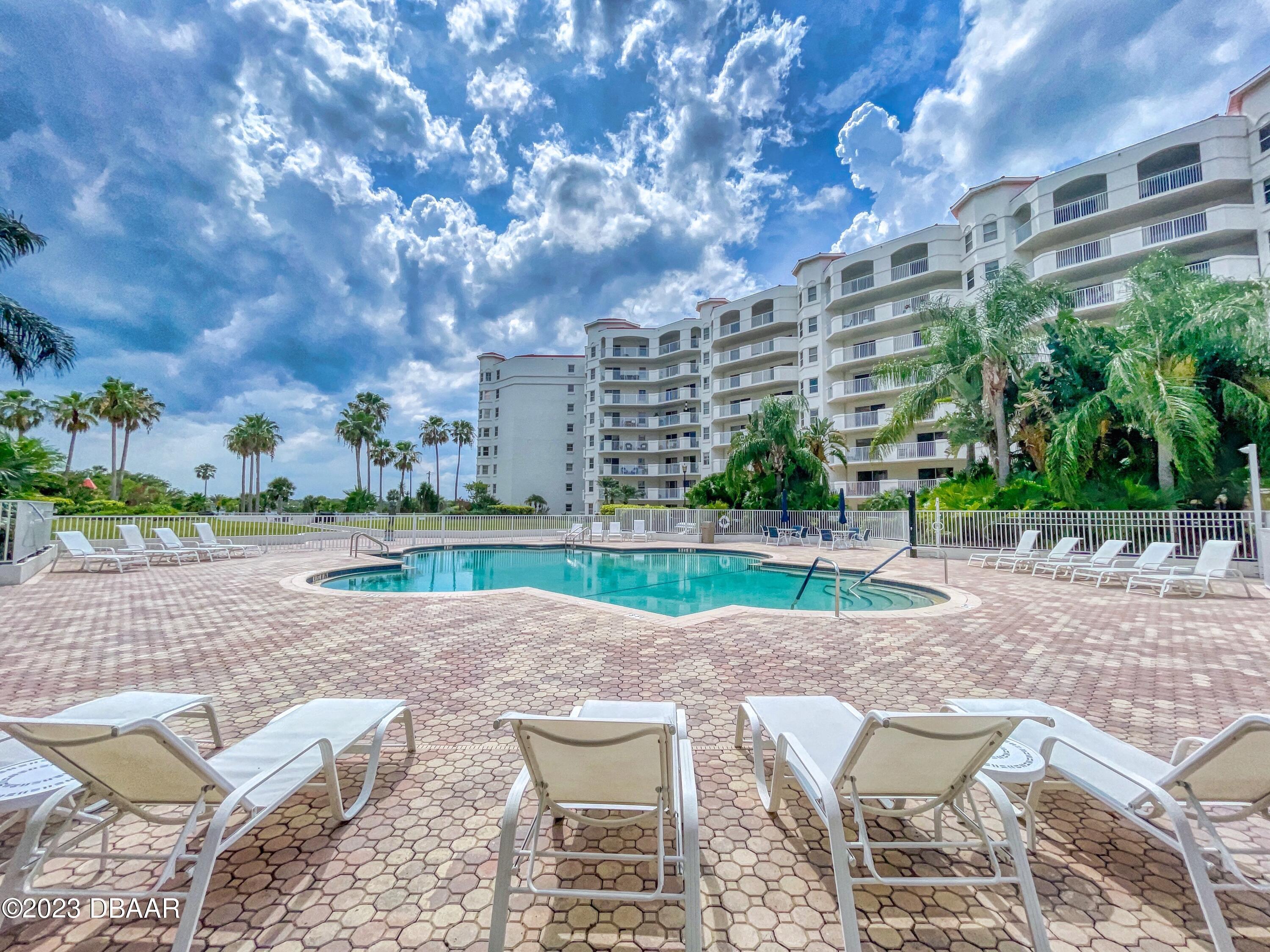 1 John Anderson Drive, Unit PH7 Ormond Beach, FL 32176 - Photo 120 of 134 a view of lake with outdoor seating