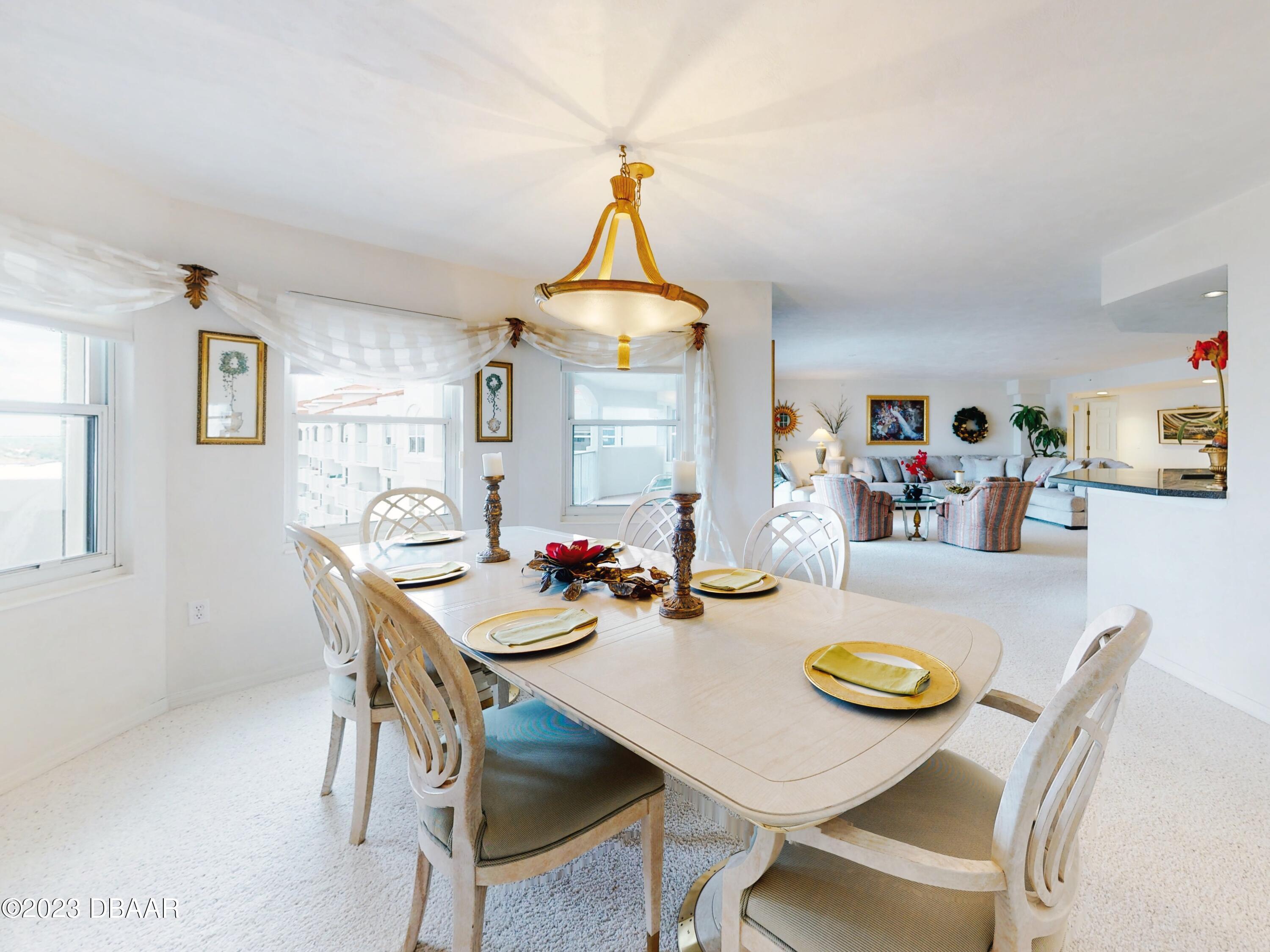 1 John Anderson Drive, Unit PH7 Ormond Beach, FL 32176 - Photo 45 of 134 a view of a dining room and livingroom