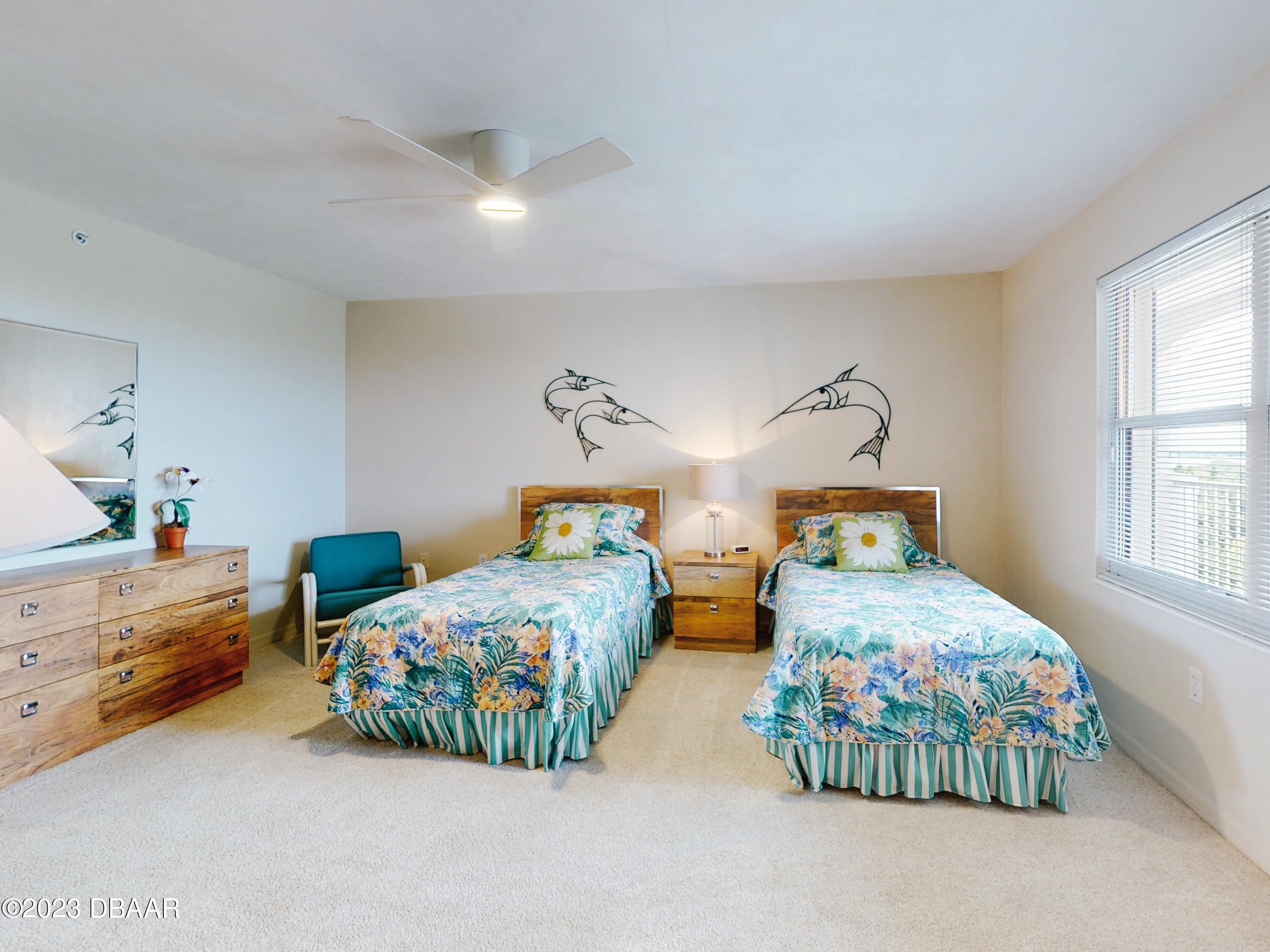 1 John Anderson Drive, Unit PH7 Ormond Beach, FL 32176 - Photo 63 of 134 a bedroom with two beds and window