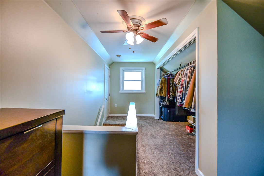 816 South Smithville Road Dayton, OH 45403 - Photo 22 of 33 An inviting interior space with plush carpet flooring and a practical walk-in closet.