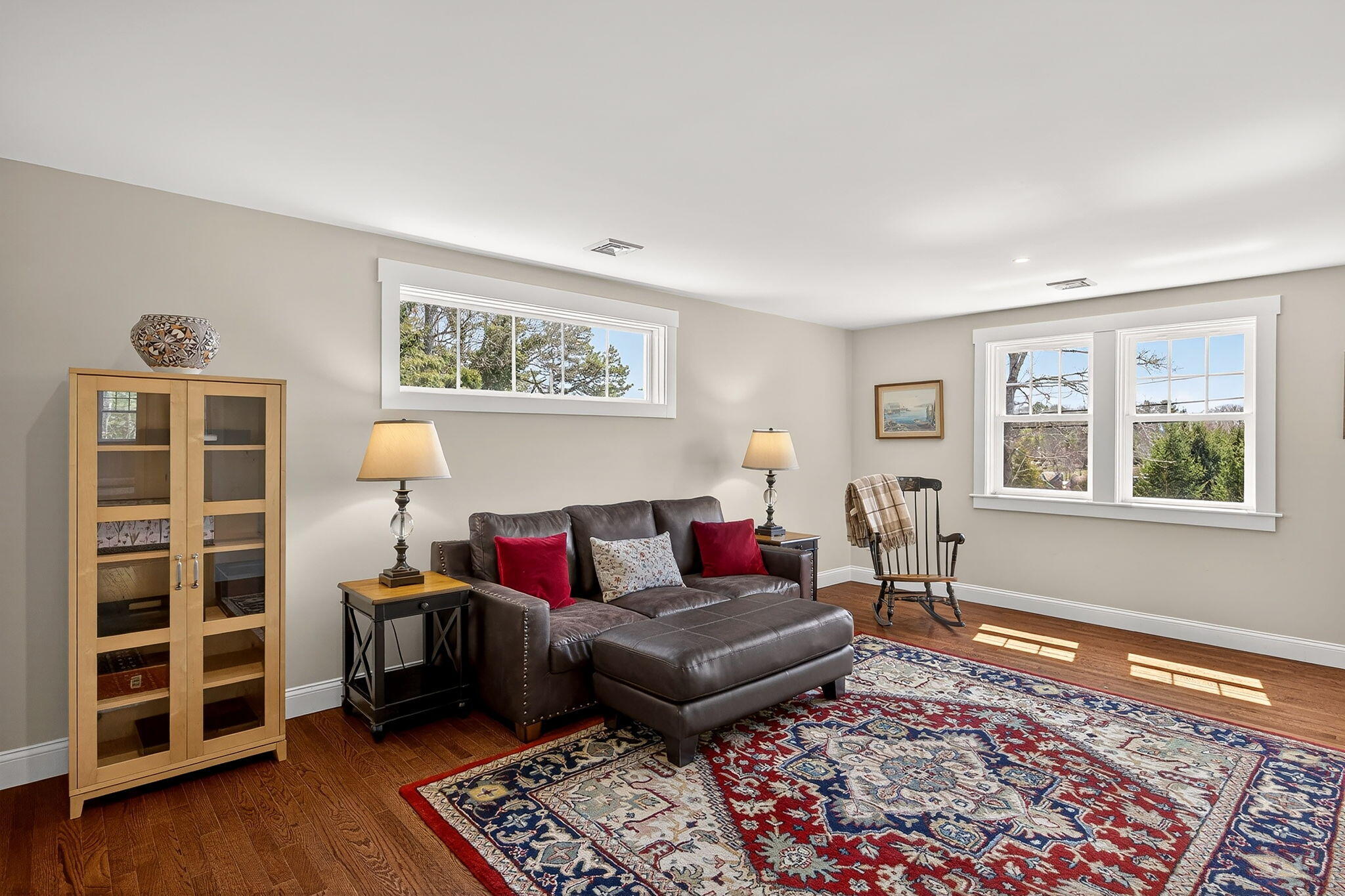 176 Bumps River Road Osterville, MA 02655 - Photo 29 of 54 a living room with furniture and a rug