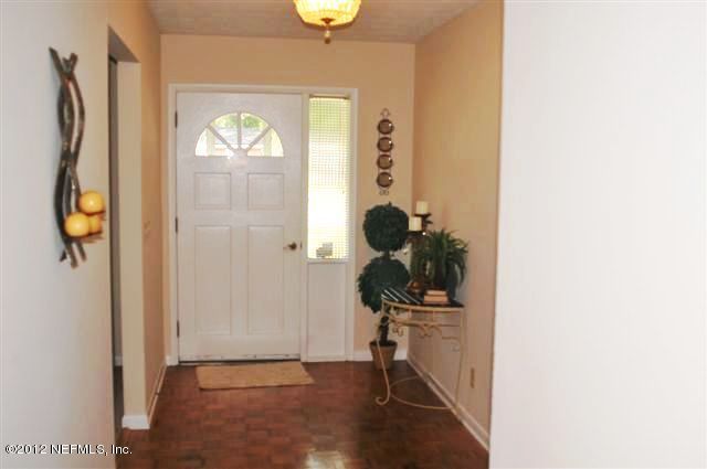 10568 Tulsa Road Jacksonville, FL 32218 - Photo 13 of 31 a view of entryway with wooden floor