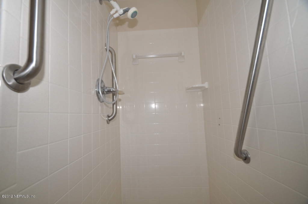 10568 Tulsa Road Jacksonville, FL 32218 - Photo 22 of 31 a bathroom with a shower
