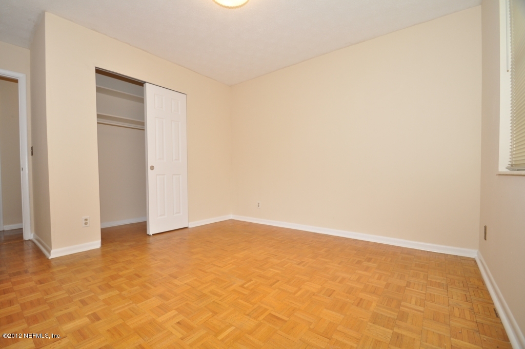 10568 Tulsa Road Jacksonville, FL 32218 - Photo 24 of 31 an empty room with an entryway