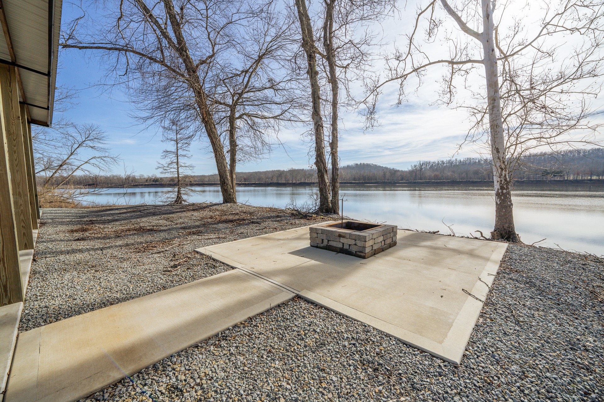209 Hardin Bottom River Road Clifton, TN 38425 - Photo 18 of 51 a view of a backyard with trees