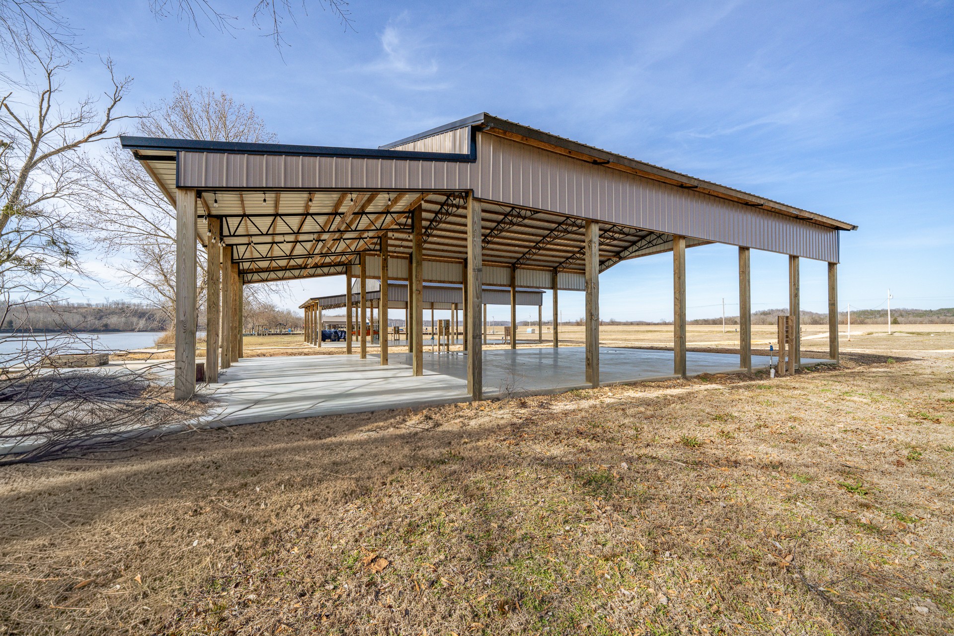 209 Hardin Bottom River Road Clifton, TN 38425 - Photo 10 of 51 a view of a house with a backyard
