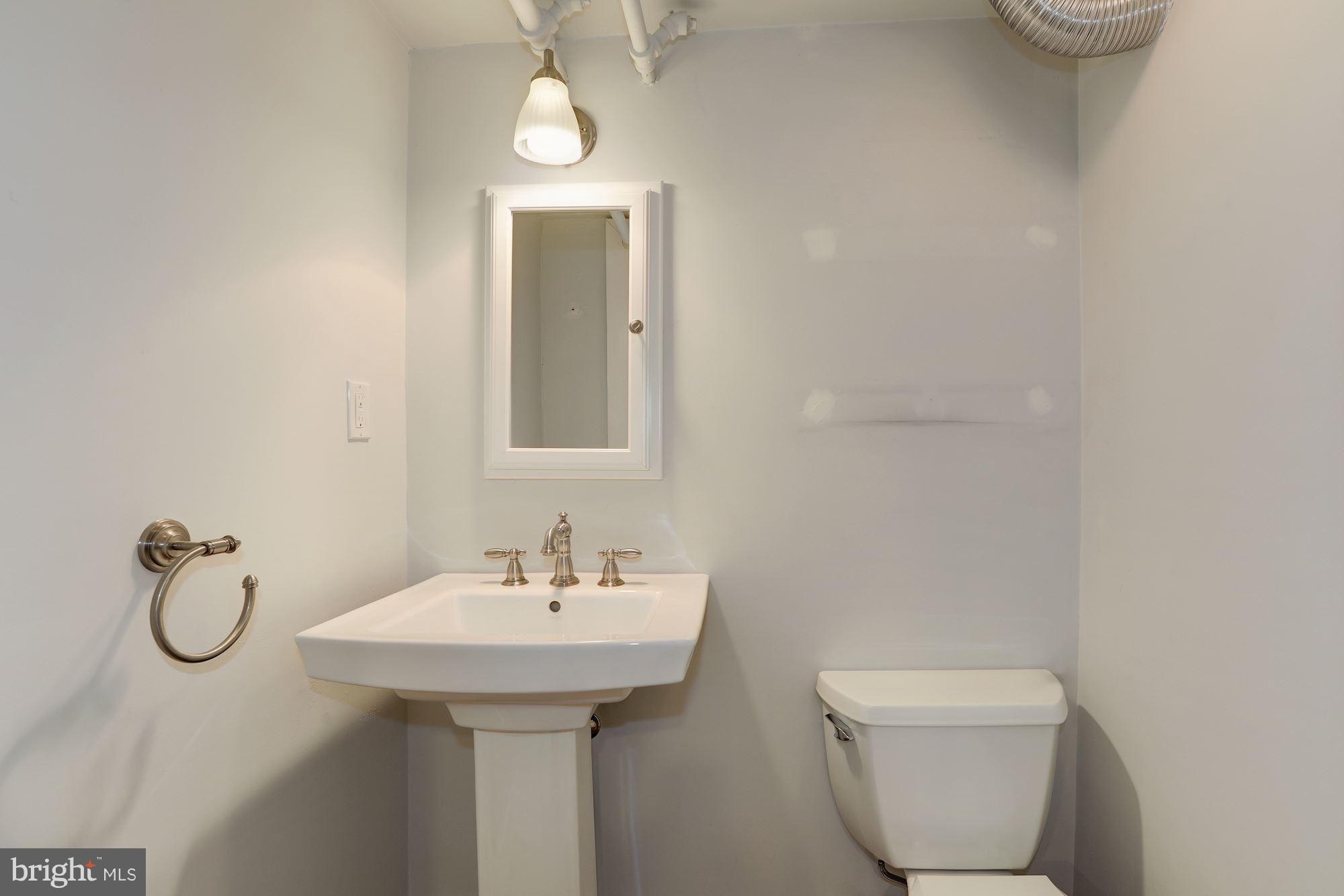 10324 Parkman Road Silver Spring, MD 20903 - Photo 26 of 30 Lower Level Powder Room