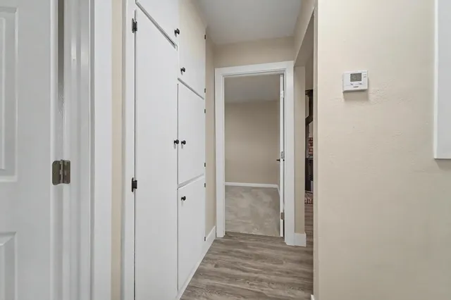 a view of a bathroom from the hallway