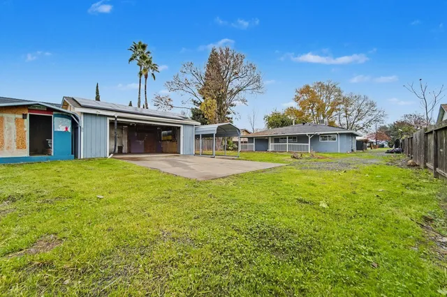 a view of a house with a swimming pool