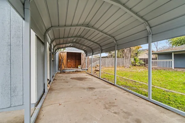 a view of swimming pool with an outdoor seating