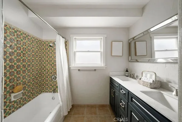 a view of a room with wooden floor and sink