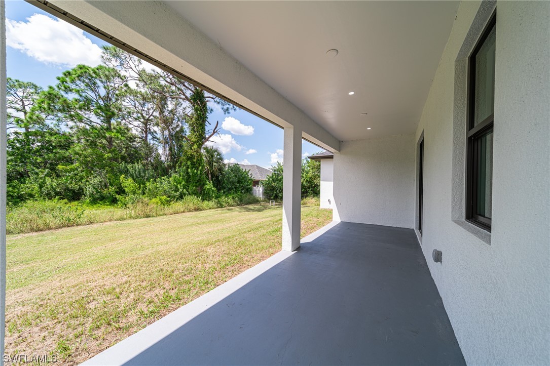 344 Rancho Avenue Lehigh Acres, FL 33974 - Photo 25 of 27 a view of an ocean from a window