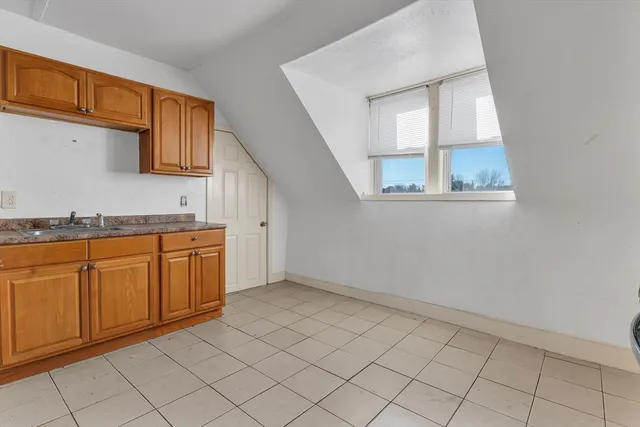 a view of cabinets and window