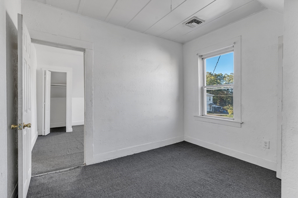 13 R Plain Street, Unit 3 Taunton, MA 02780 - Photo 10 of 19 an empty room with a window