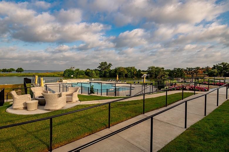 2715 Triumph Court Heath, TX 75126 - Photo 20 of 30 a view of a lake with couches