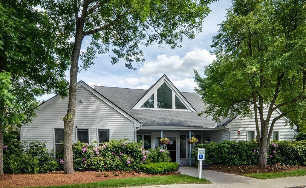 2 Walden Drive, Unit 5 Natick, MA 01760 - Photo 14 of 18 a front view of a house with a yard