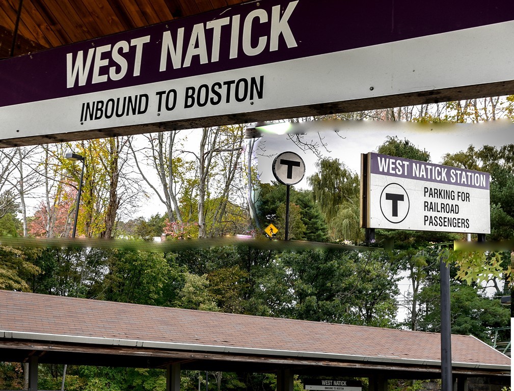 2 Walden Drive, Unit 5 Natick, MA 01760 - Photo 18 of 18 a front of a building with a street sign