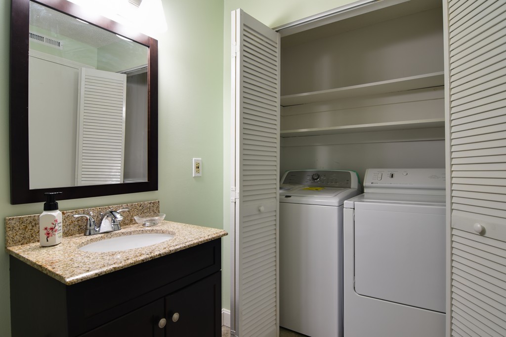 2 Walden Drive, Unit 5 Natick, MA 01760 - Photo 10 of 18 a bathroom with a granite countertop sink and a mirror