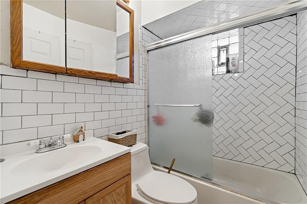 811 6th Street McKees Rocks, PA 15136 - Photo 11 of 19 a bathroom with a sink toilet and shower