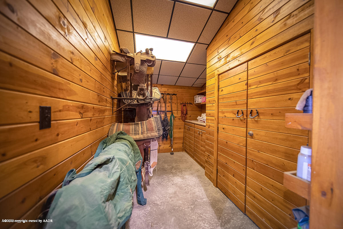 18 Helium Road Amarillo, TX 79124 - Photo 50 of 63 18_Helium_Barn-13_Cedar_Planked_Tack_Roo