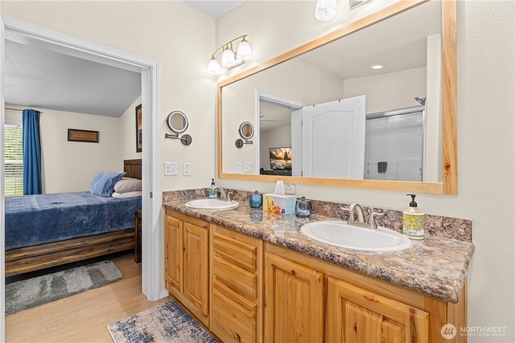 132 River Park Road Forks, WA 98331 - Photo 18 of 40 a bathroom with a granite countertop double vanity sink and a mirror