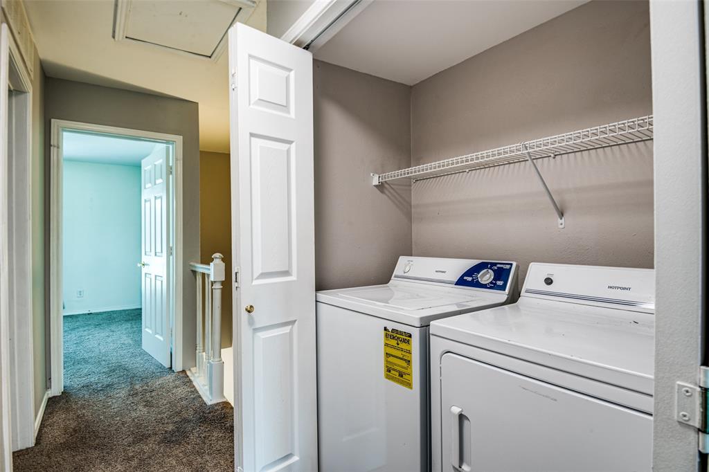 9801 Royal Lane, Unit 711 Dallas, TX 75231 - Photo 21 of 23 a utility room with dryer and washer